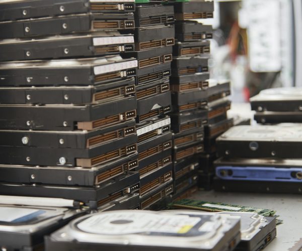 Old computer hard disks in recycling plant